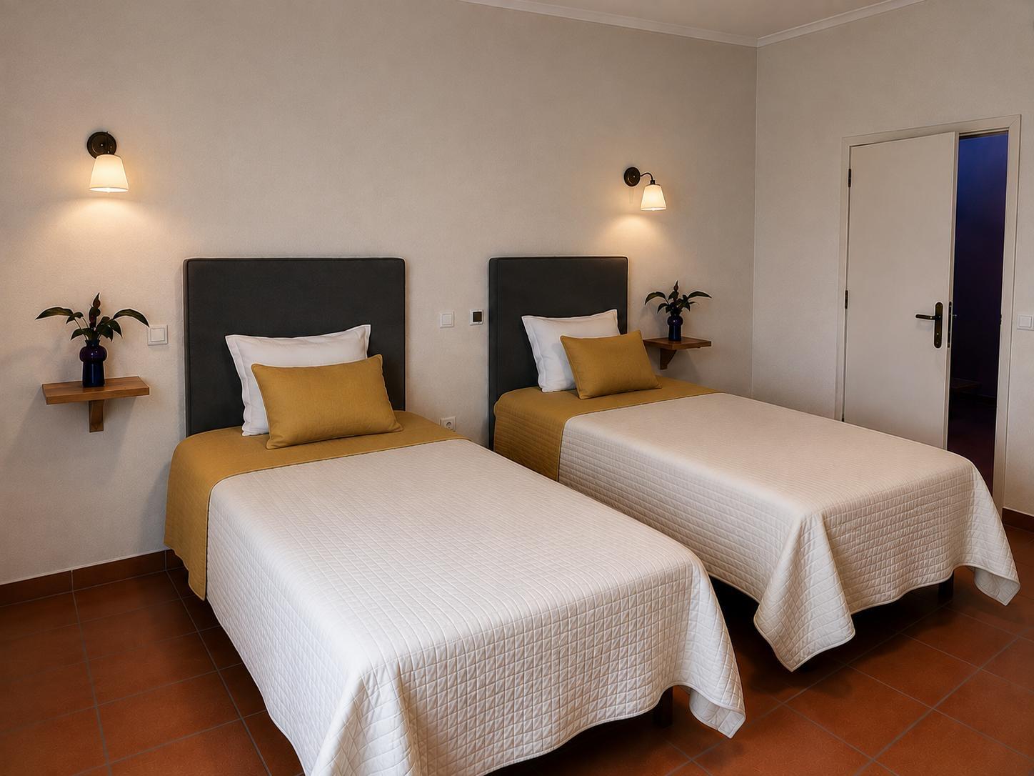 Quarto twin com duas camas individuais